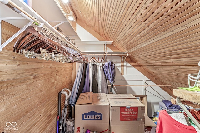 walk in closet featuring lofted ceiling