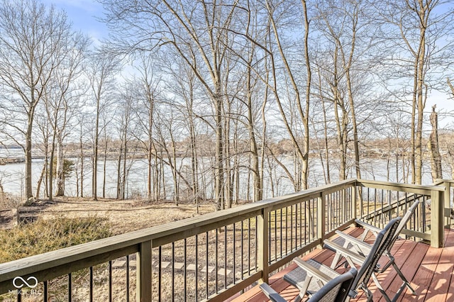 wooden deck with a water view