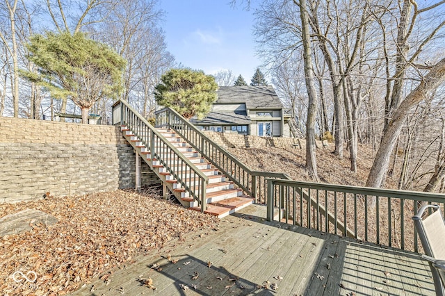 wooden terrace featuring stairs