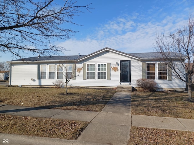 view of front of property featuring metal roof