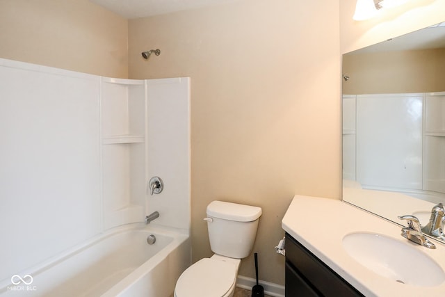 full bathroom featuring tub / shower combination, vanity, and toilet