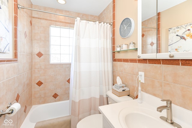 full bath with toilet, shower / bath combination with curtain, tile walls, and vanity