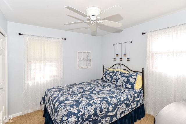 bedroom featuring ceiling fan and carpet flooring