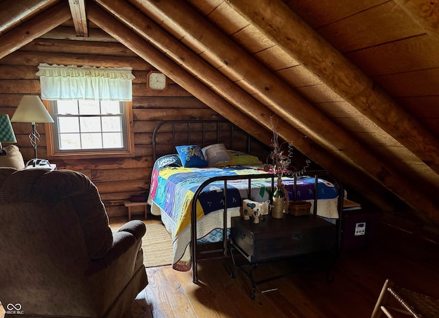 bedroom with vaulted ceiling, wood-type flooring, and log walls