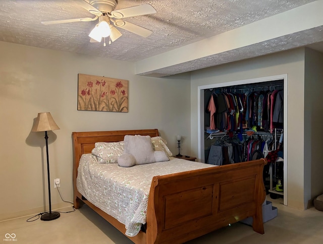 bedroom featuring a closet, a ceiling fan, and a textured ceiling