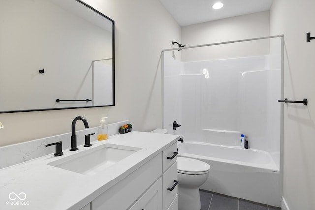 bathroom with tile patterned floors, vanity, toilet, and shower / tub combination