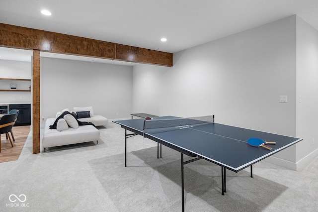 rec room with baseboards, light carpet, and recessed lighting
