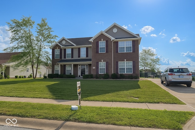 254 Halldale Dr, Whiteland, IN 46184 - view of front of house featuring a front yard and brick siding