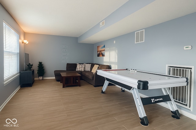 254 Halldale Dr, Whiteland, IN 46184 - recreation room with light wood finished floors and baseboards