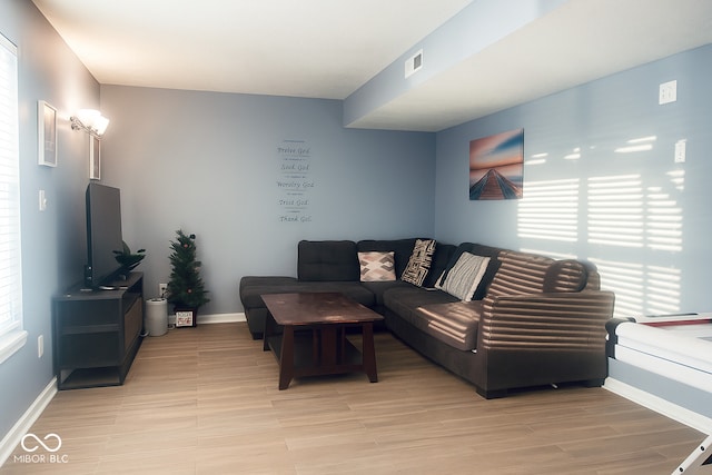 254 Halldale Dr, Whiteland, IN 46184 - living room with baseboards and light wood finished floors