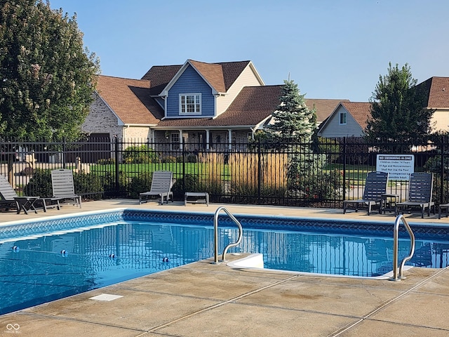 community pool with fence