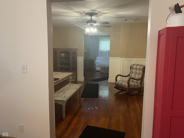 5533 Wilson Way, Jamestown, IN 46147 - living area featuring hardwood / wood-style flooring, ceiling fan, and a wainscoted wall