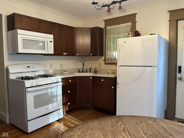 5533 Wilson Way, Jamestown, IN 46147 - kitchen featuring white appliances, a sink, dark brown cabinetry, light countertops, and crown molding