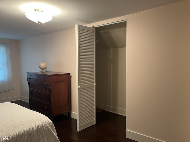 5533 Wilson Way, Jamestown, IN 46147 - bedroom featuring baseboards, dark wood-style flooring, and a closet