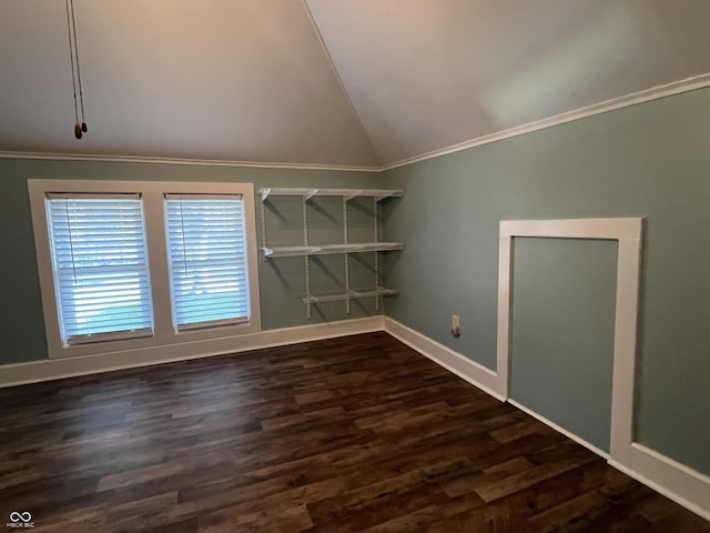 5533 Wilson Way, Jamestown, IN 46147 - empty room featuring vaulted ceiling, crown molding, dark wood-type flooring, and baseboards