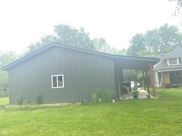 5533 Wilson Way, Jamestown, IN 46147 - view of property exterior with a lawn and board and batten siding