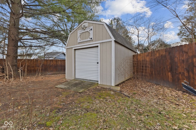 view of shed with a fenced backyard