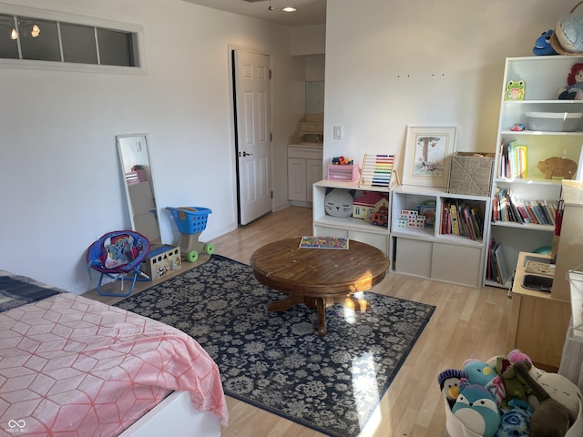 bedroom with wood finished floors