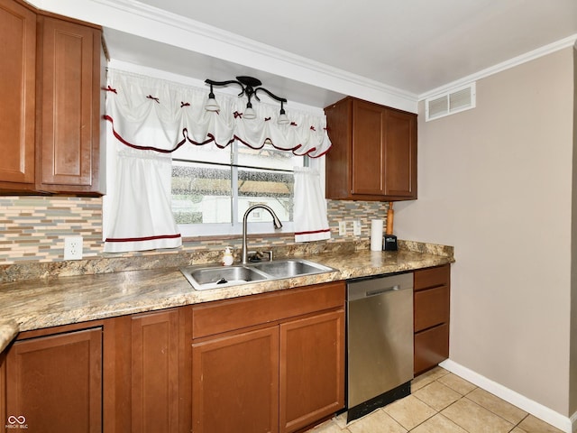 kitchen featuring visible vents, dishwasher, brown cabinets, crown molding, and a sink