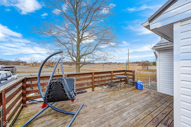 deck featuring a rural view