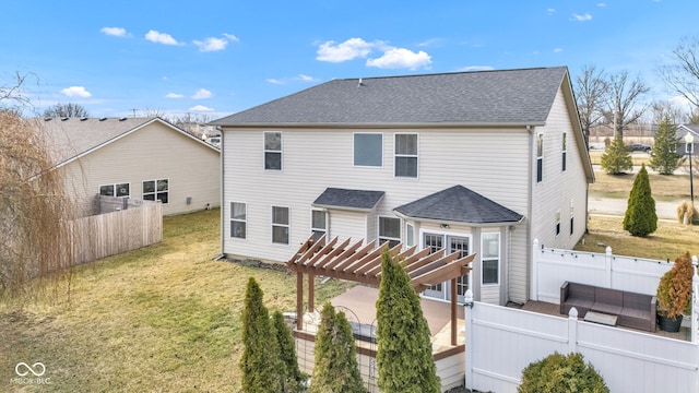 back of house with roof with shingles, a lawn, an outdoor hangout area, a pergola, and a fenced backyard