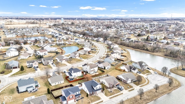 aerial view featuring a water view and a residential view