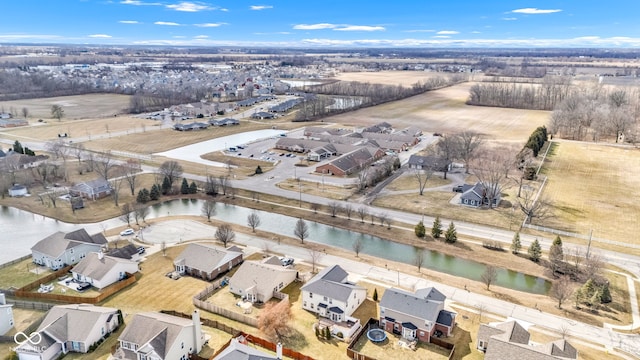 aerial view featuring a water view and a residential view