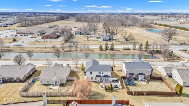 aerial view featuring a water view and a residential view