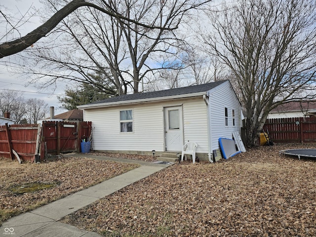 view of front of house featuring entry steps and fence