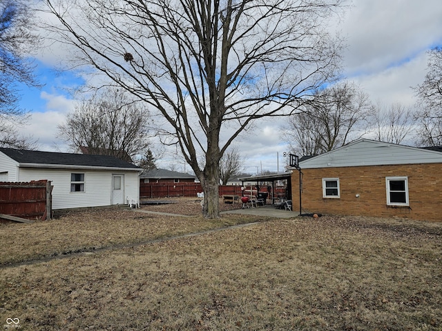 view of yard with a patio and fence