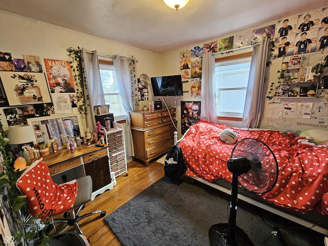 bedroom featuring light wood-style floors