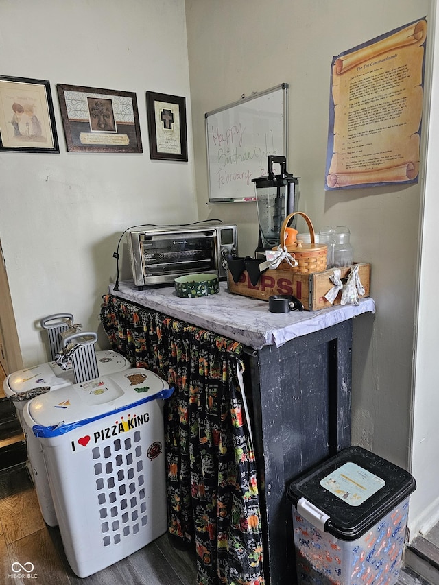 interior space featuring a toaster and wood finished floors