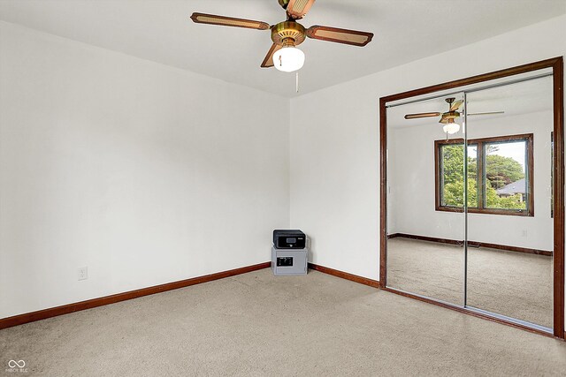 211 Deborah Ln, Whiteland, IN 46184 - carpeted spare room with baseboards and a ceiling fan