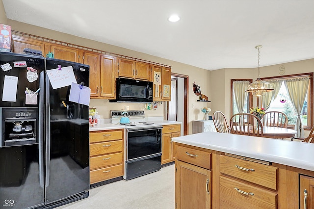 211 Deborah Ln, Whiteland, IN 46184 - kitchen featuring black appliances, light countertops, a chandelier, decorative light fixtures, and brown cabinets