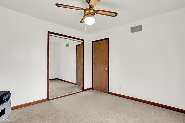 211 Deborah Ln, Whiteland, IN 46184 - unfurnished room with light carpet, baseboards, and ceiling fan