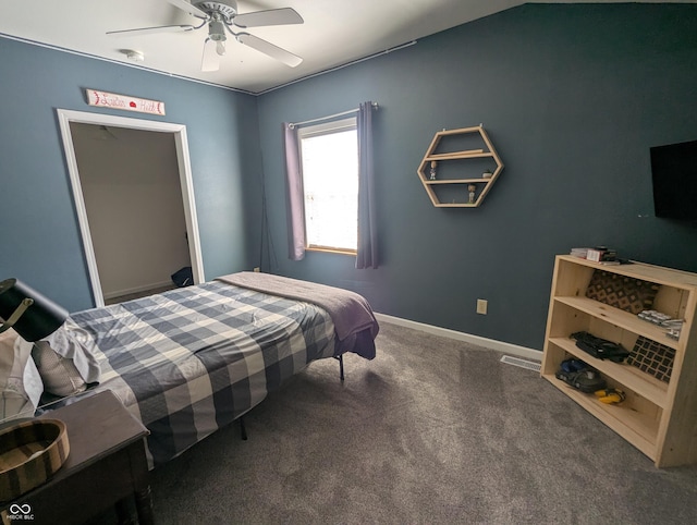 carpeted bedroom with visible vents, ceiling fan, and baseboards