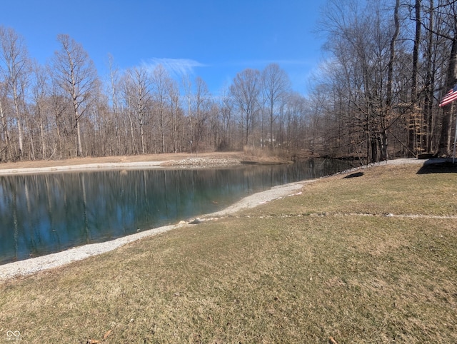 view of water feature with a wooded view