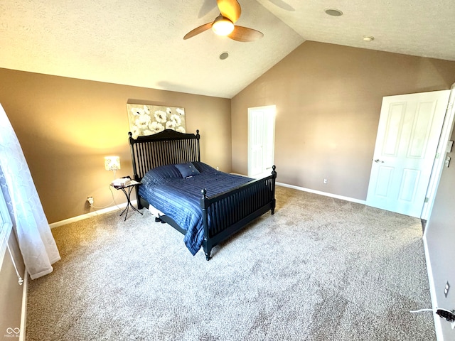 carpeted bedroom featuring lofted ceiling, a textured ceiling, baseboards, and a ceiling fan