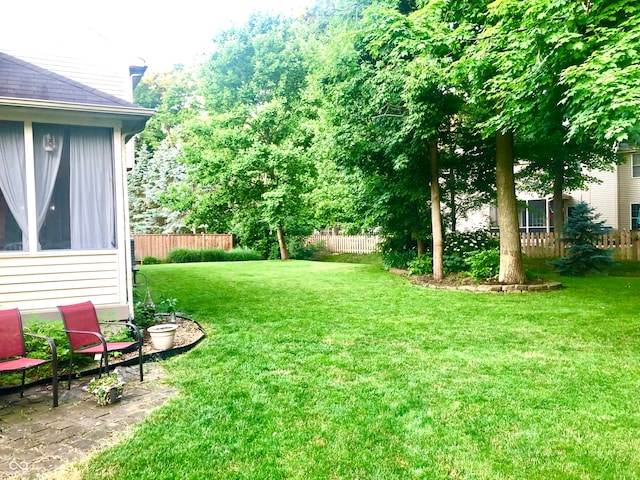 view of yard with fence