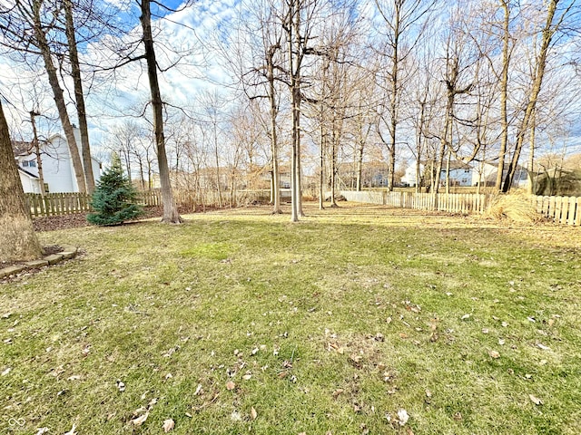 view of yard with fence