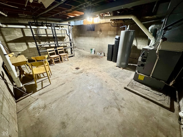 unfinished basement with gas water heater and heating unit