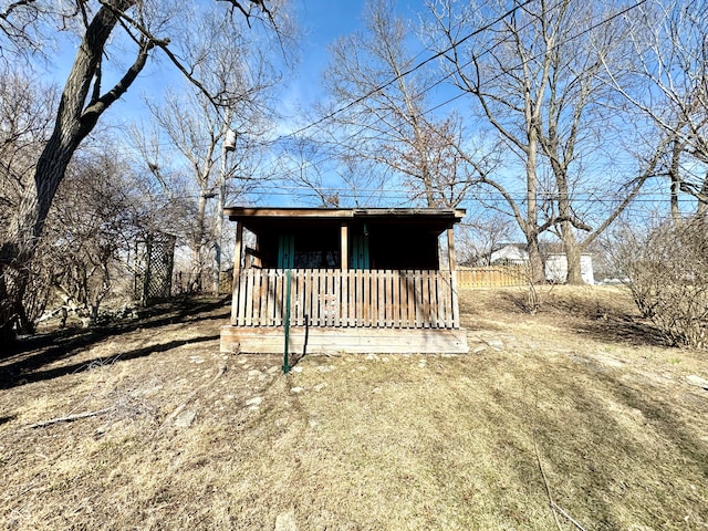 view of outdoor structure with fence