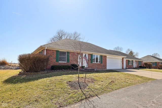 ranch-style house featuring a front lawn, an attached garage, brick siding, and driveway