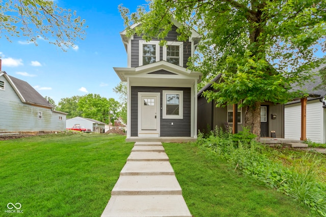 view of front of house featuring a front lawn