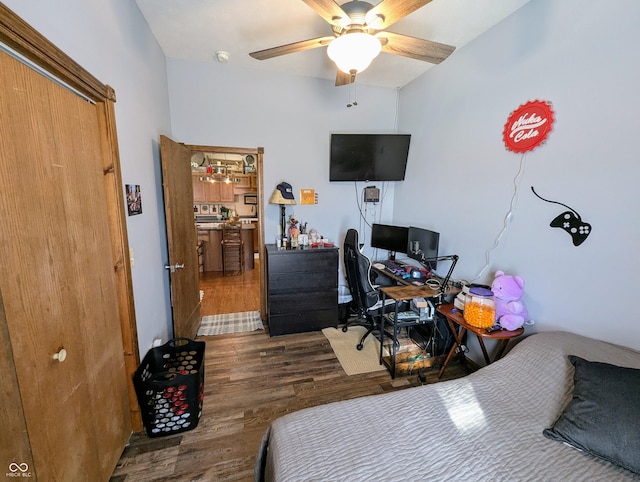 bedroom featuring a ceiling fan and dark wood-type flooring