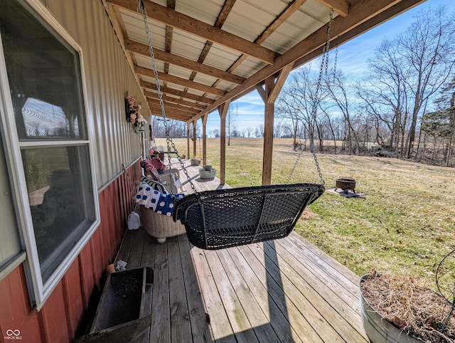 wooden deck with a yard