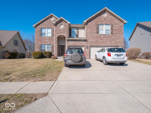 traditional-style home featuring a front lawn, brick siding, driveway, and an attached garage