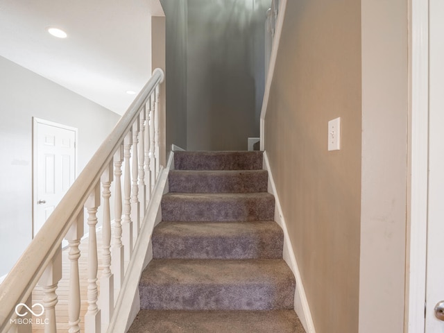 stairs featuring recessed lighting, carpet flooring, and baseboards