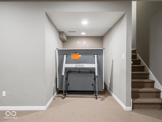 exercise area with recessed lighting, carpet flooring, visible vents, and baseboards