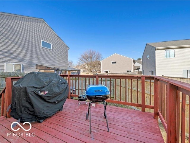 wooden deck featuring grilling area